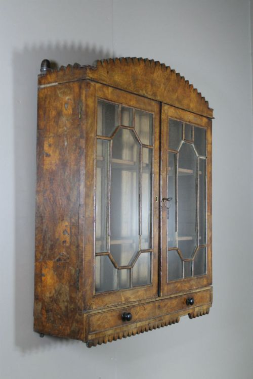 a 19th century pollard oak hanging cabinet