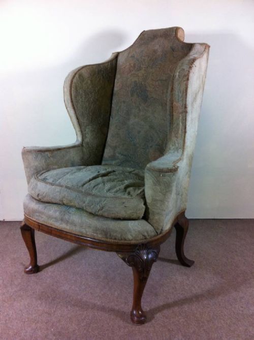 a 19th century walnut wing armchair