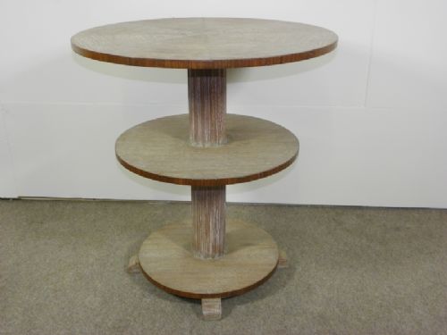 a 1930s circular threetier table