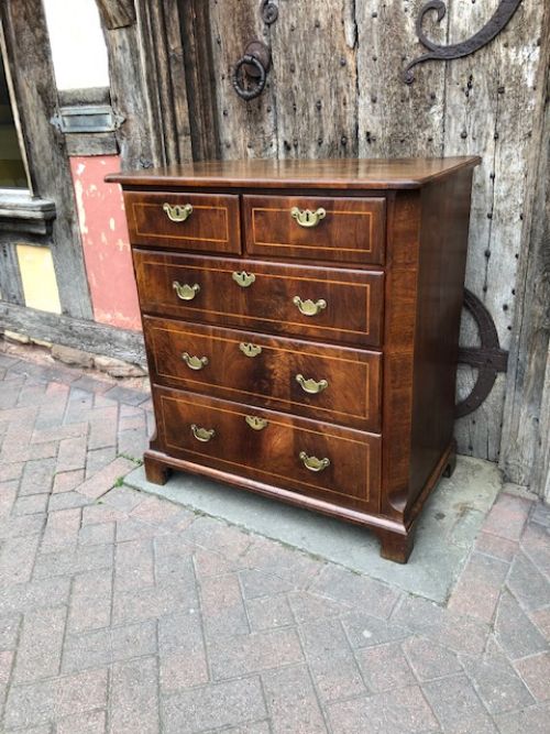 an 18thc walnut chest of drawers