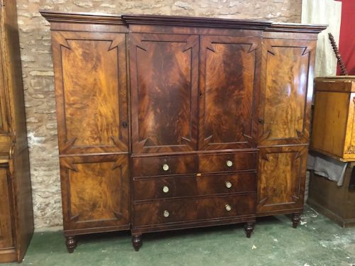 a 19thc flamed mahogany breakfront combination wardrobe by gillows of lancaster