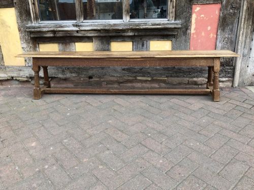 a pair of 1920s oak benches in the 17thc style