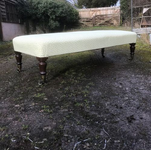 19thc mahogany turned leg long stool covered in ticking