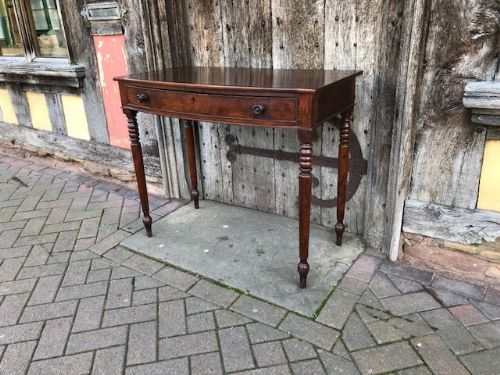 an early 19thc mahogany bow fronted single drawer side table