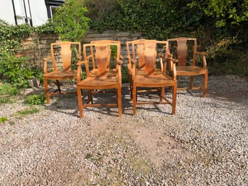 a set of 6 heals light oak armchairs
