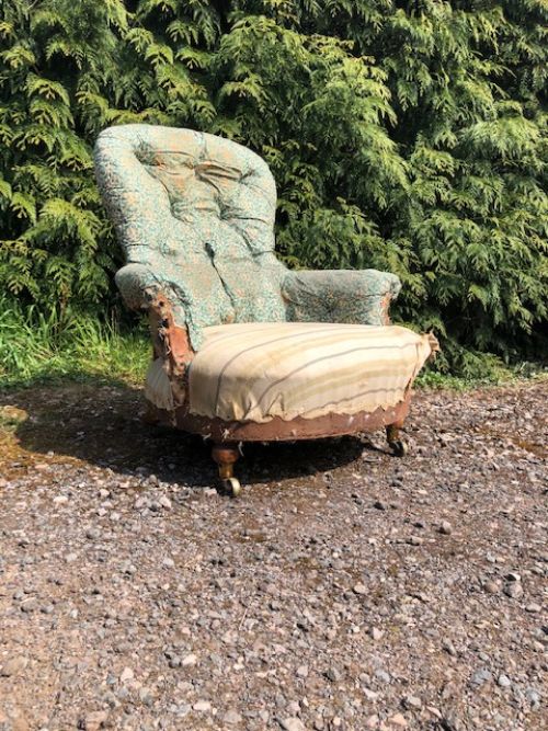 an early howard sons armchair for uphosltery