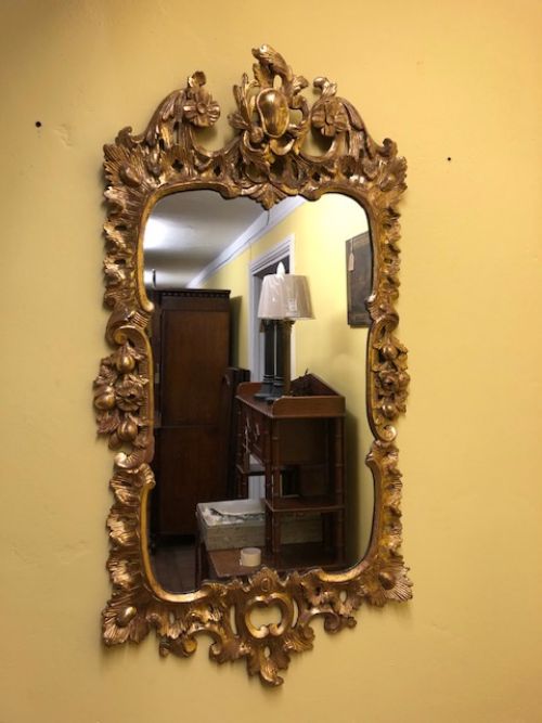 an 18thc carved wood and gilded chippendale period mirror