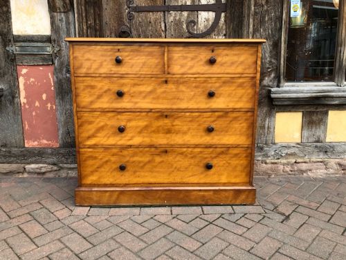 a 19th century gillow birchwood chest of drawers with rosewood handles