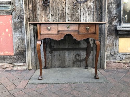 an early 18thc solid walnut queen anne period lowboy