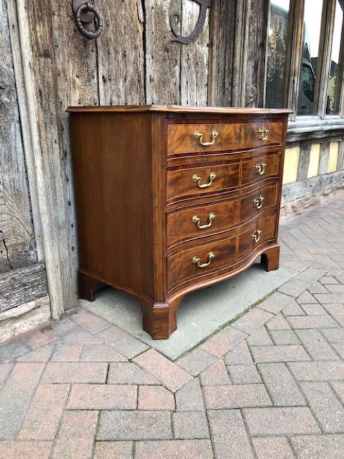a wonderful figured 18thc mahogany serpentine chest of drawers