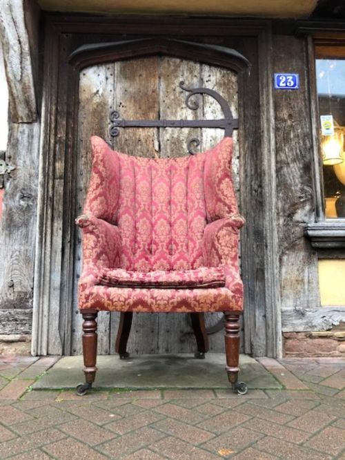 19th century barrel back wing armchair