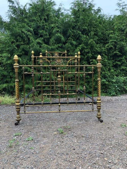 a bold 19th century brass bed