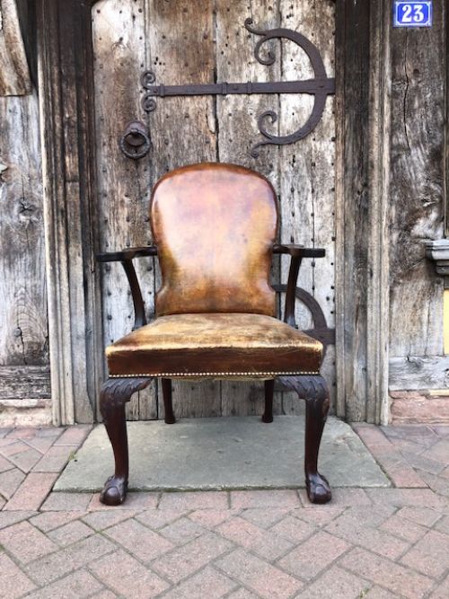 a george iii mahogany armchair with ball and claw feet
