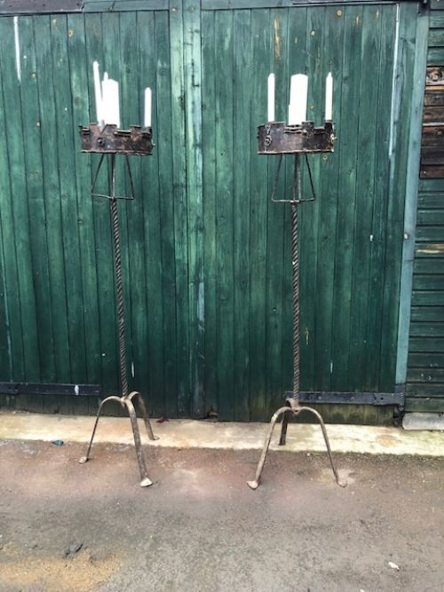 a pair of 19th century wrought iron candlestands