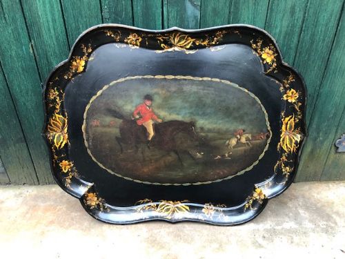 a 19th century papier mache tray depicting a hunting scene