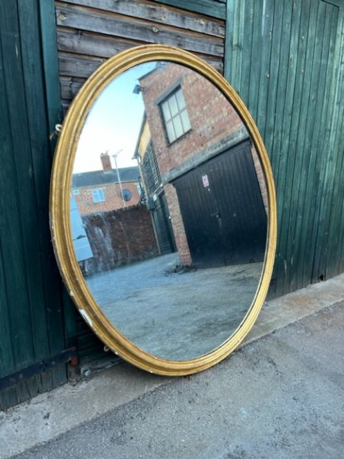 19th century large oval mirror