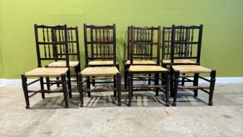 a set of eight 18th century spindleback country dining chairs with rush seats
