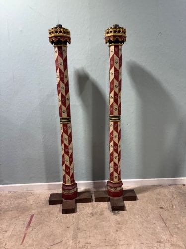 a pair of gothic revival painted candlesticks