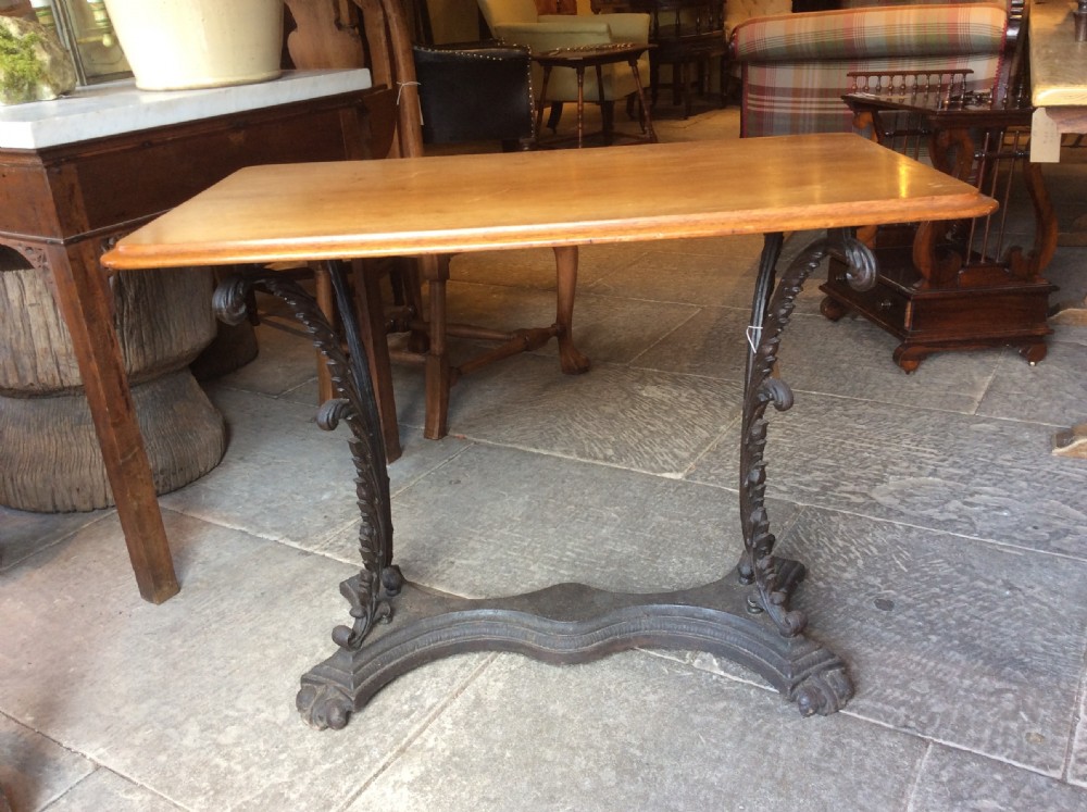 19th c mahogany top table on cast iron base