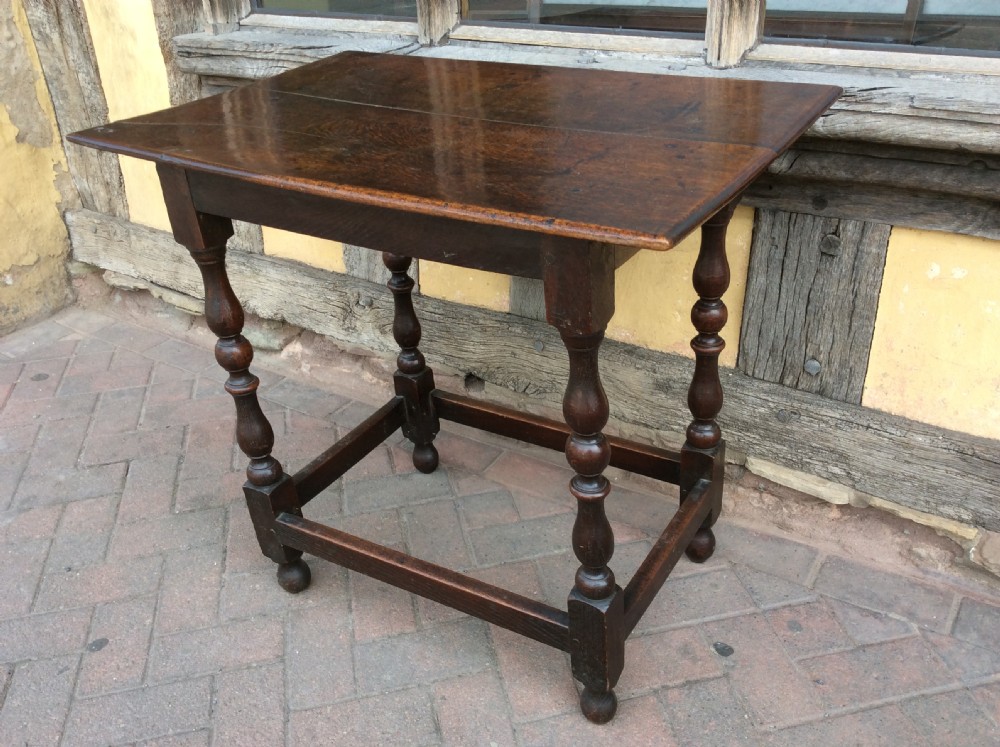 late 17thc oak centre table with peripheral stretcher