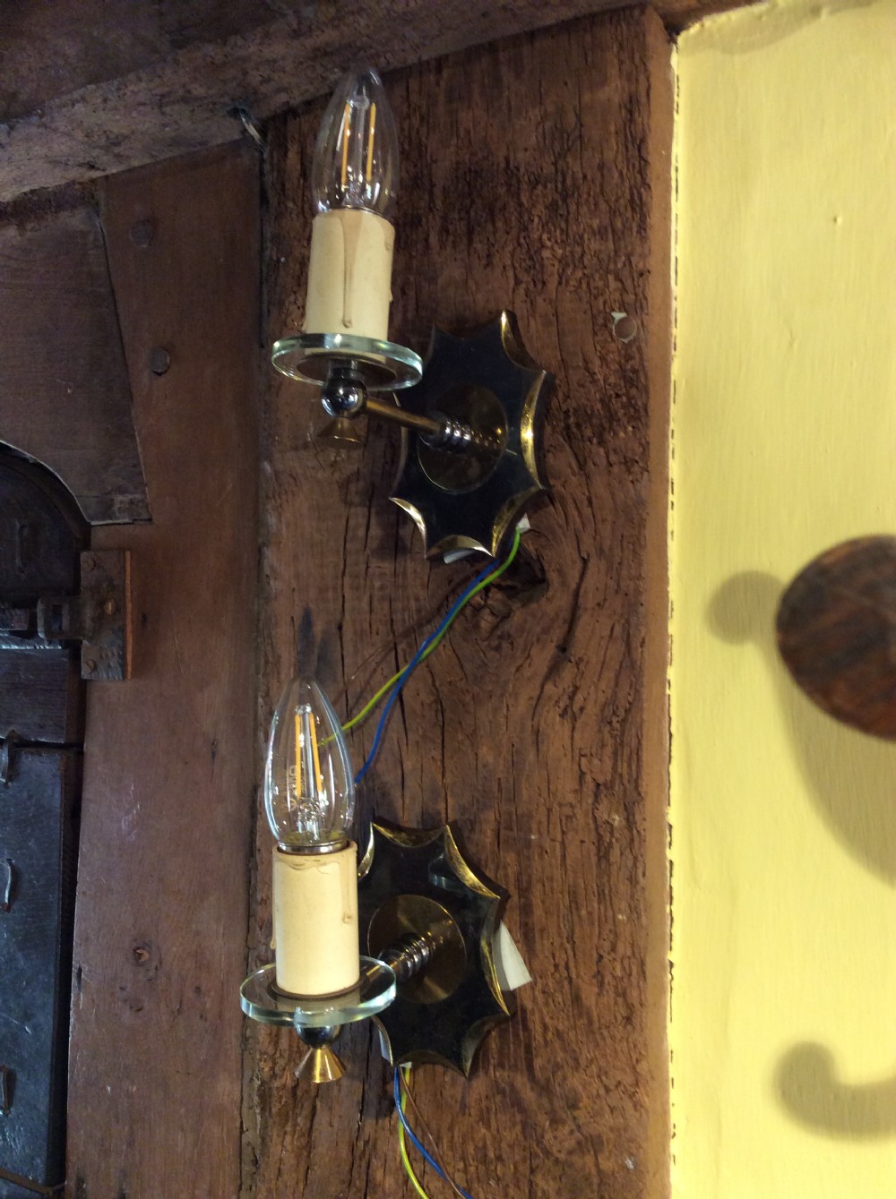pair of brass and glass wall lights