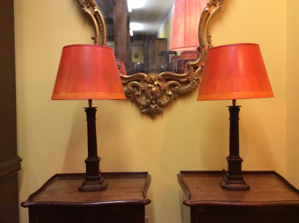 a pair of 19thc mahogany column lamps