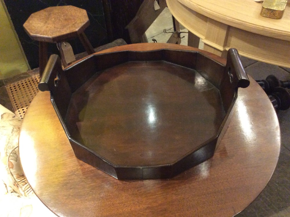an 18thc mahogany tray of dodecadon shape with 2 pierced handles