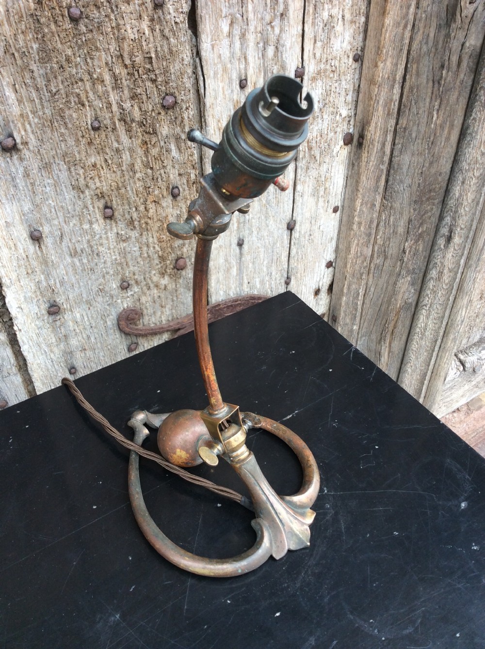 a benson arts and craft brass table lamp