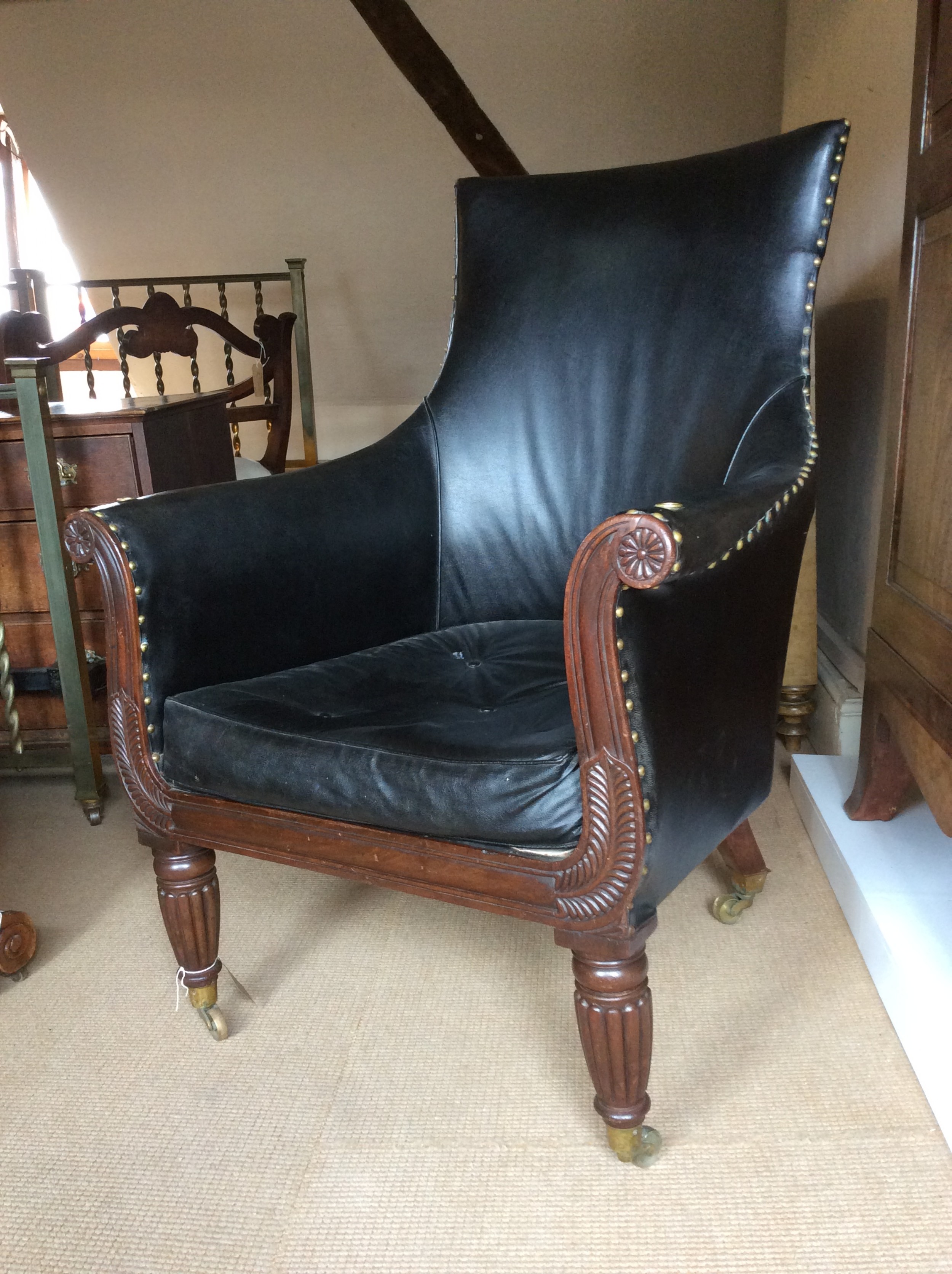 a great scale regency mahogany bergere library armchair