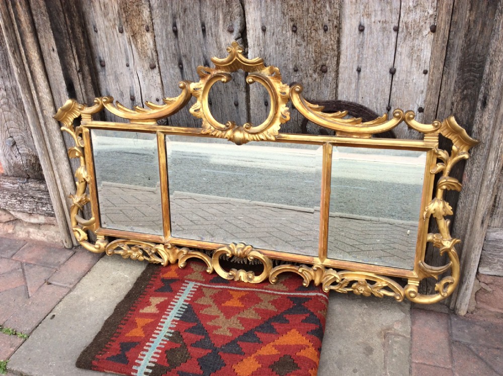 a 3 section gilded mirror