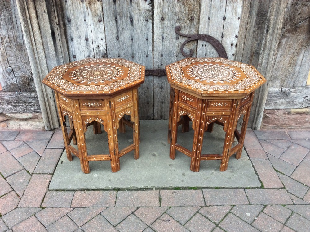 a pair of octagonal moorish tables