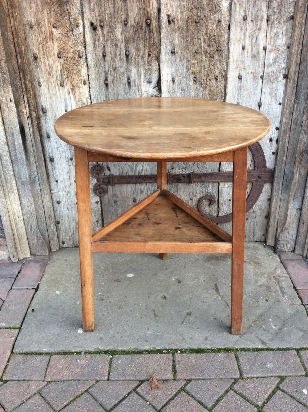 an early 20thc oak cricket table