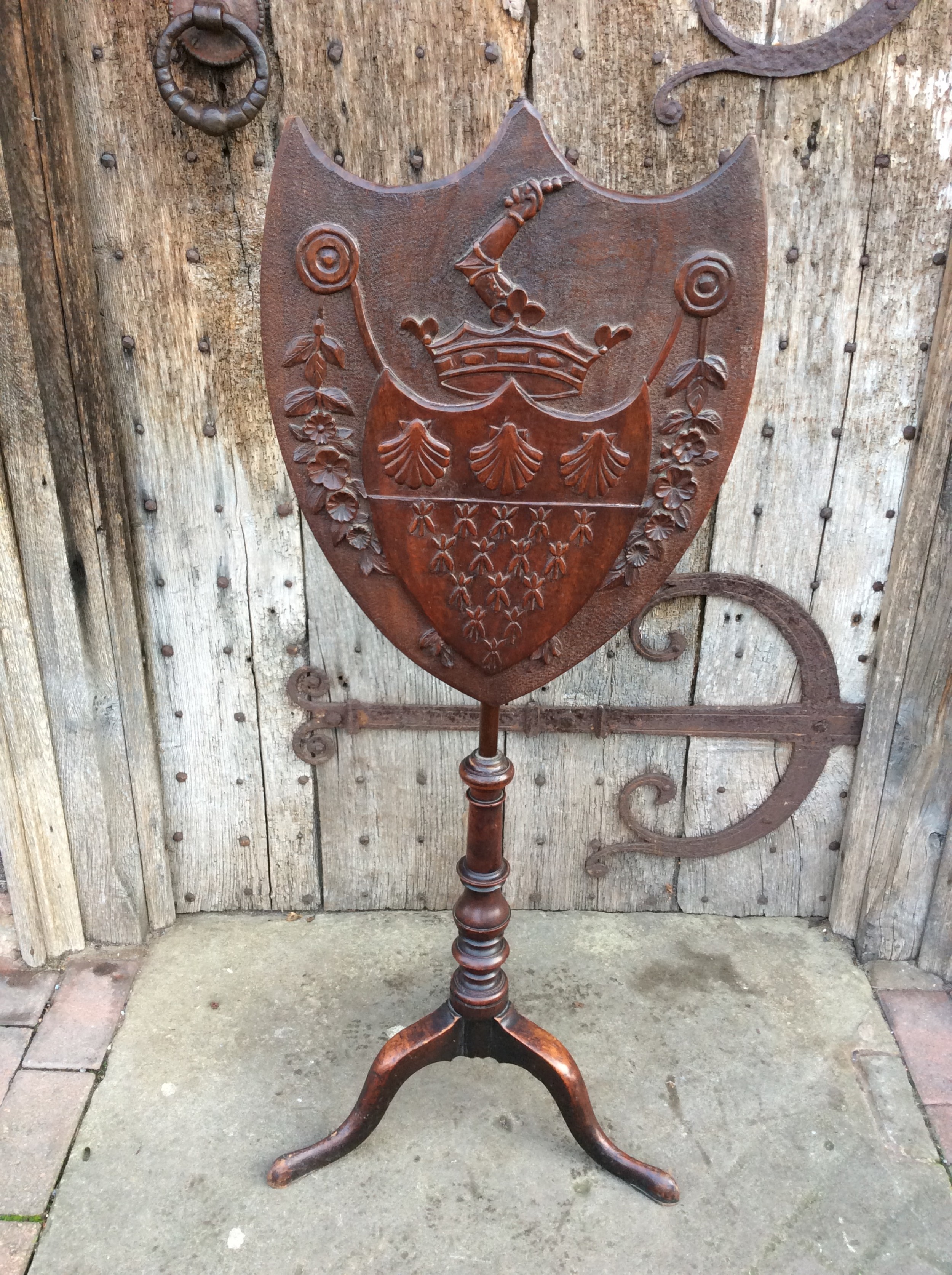 a 19thc carved shield screen coat of arms