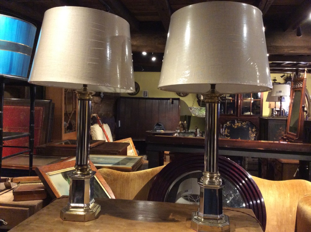 a pair of chrome and brass 1950s table lamps