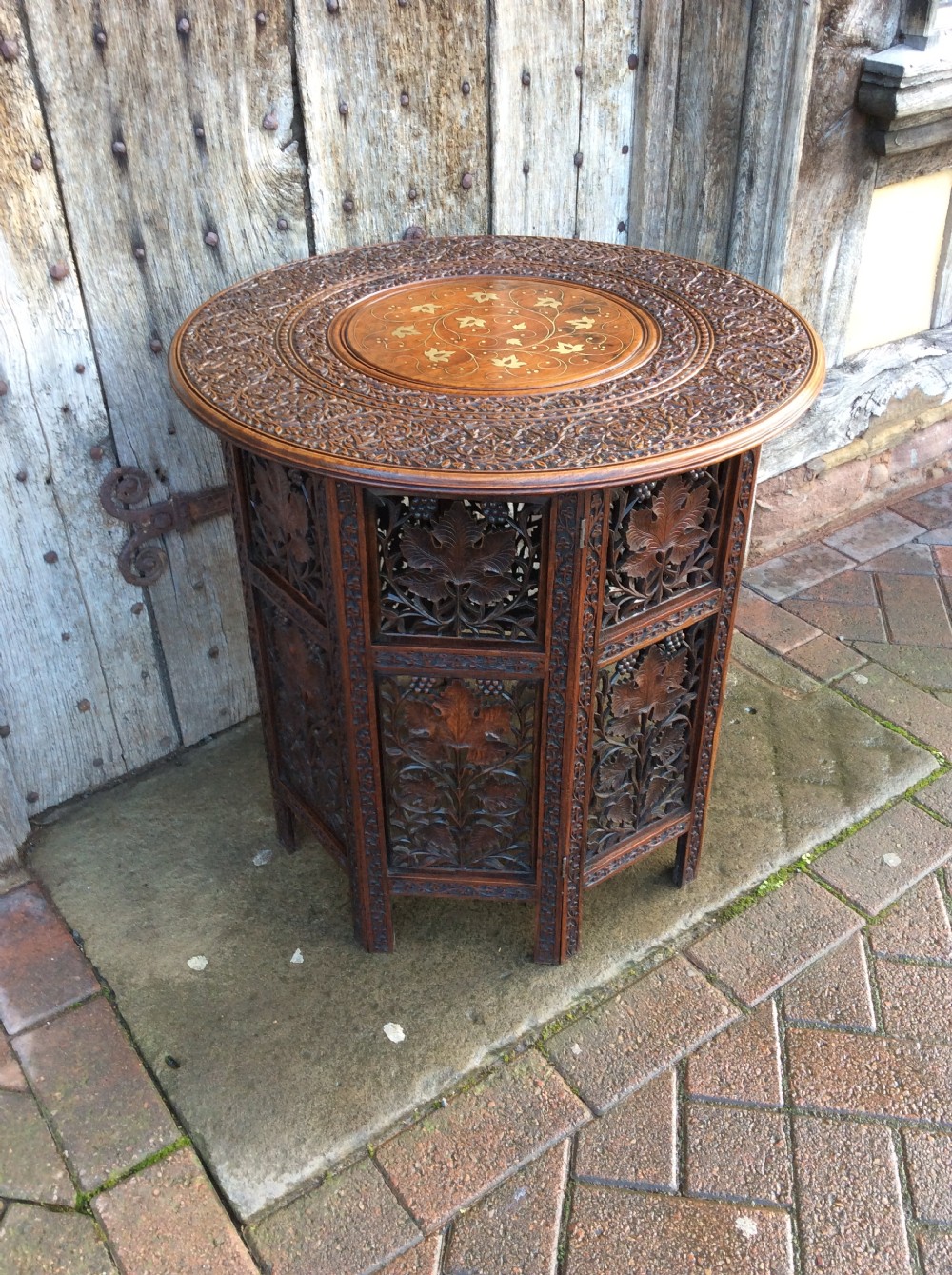 a brass inlay moorish folding table