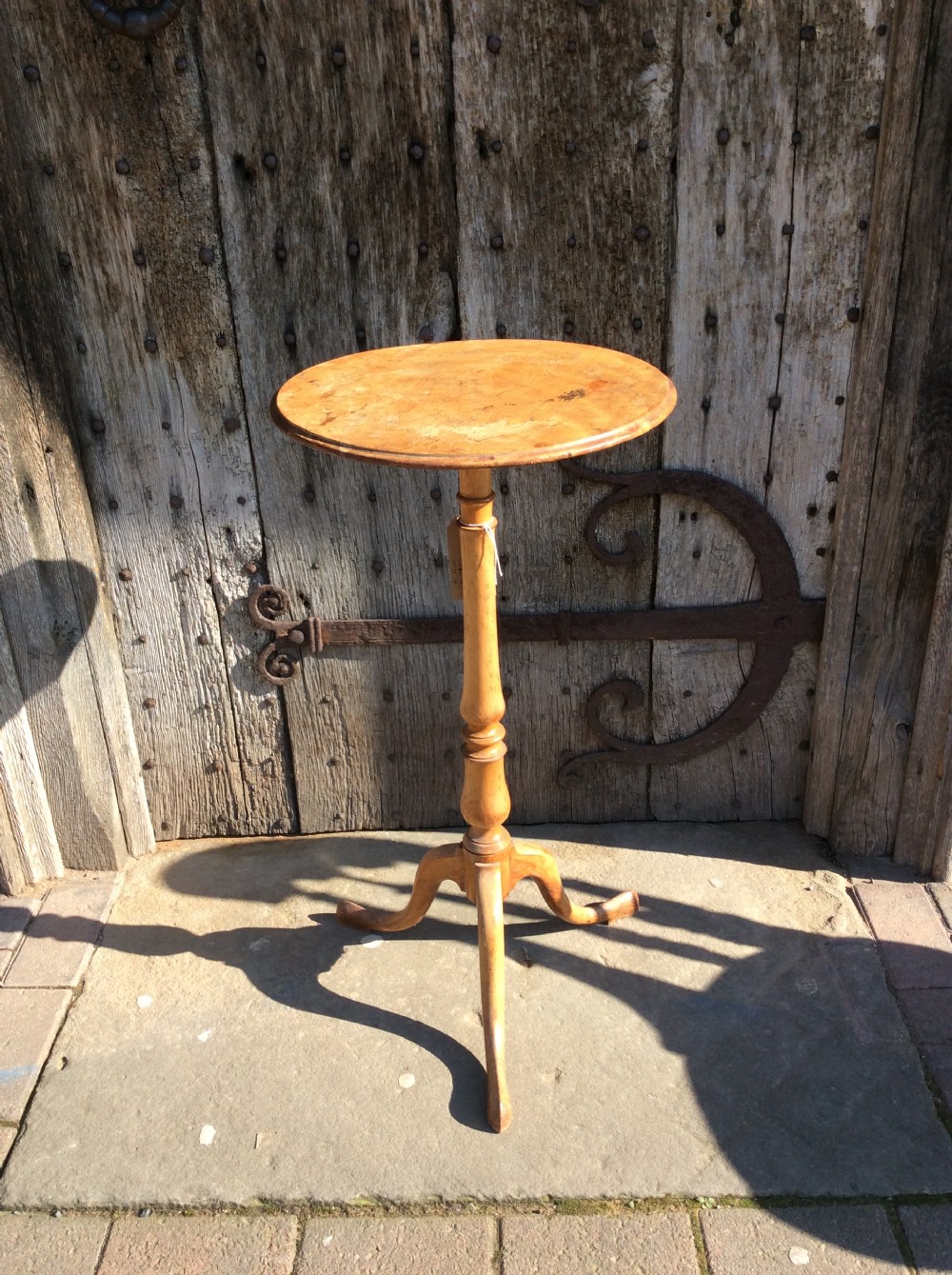 a 19thc birchwood tripod table attributed to holland sons