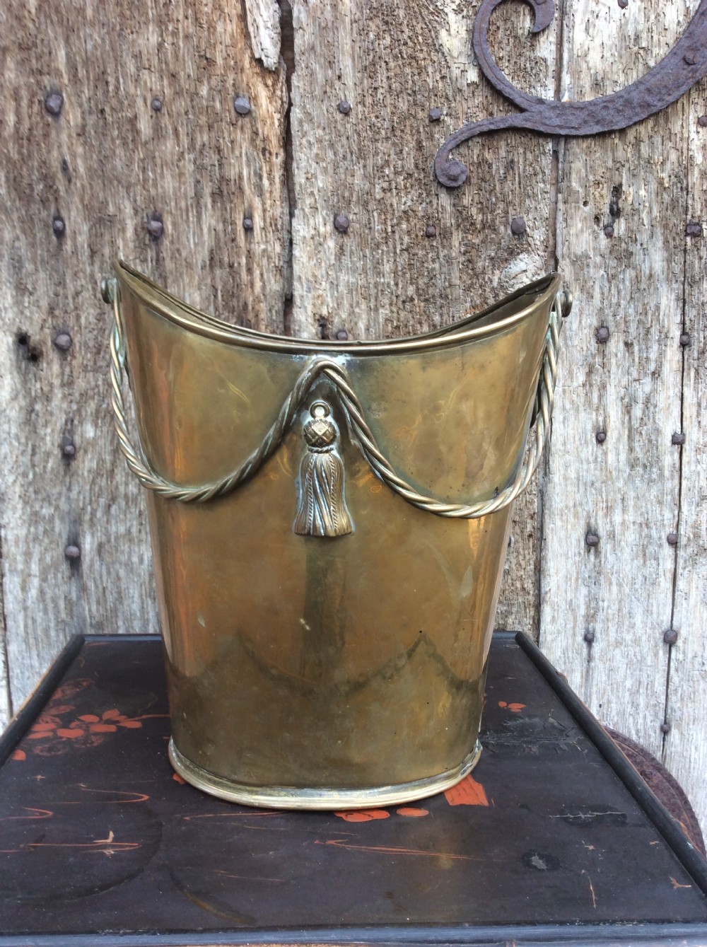 an edwardian brass bucket