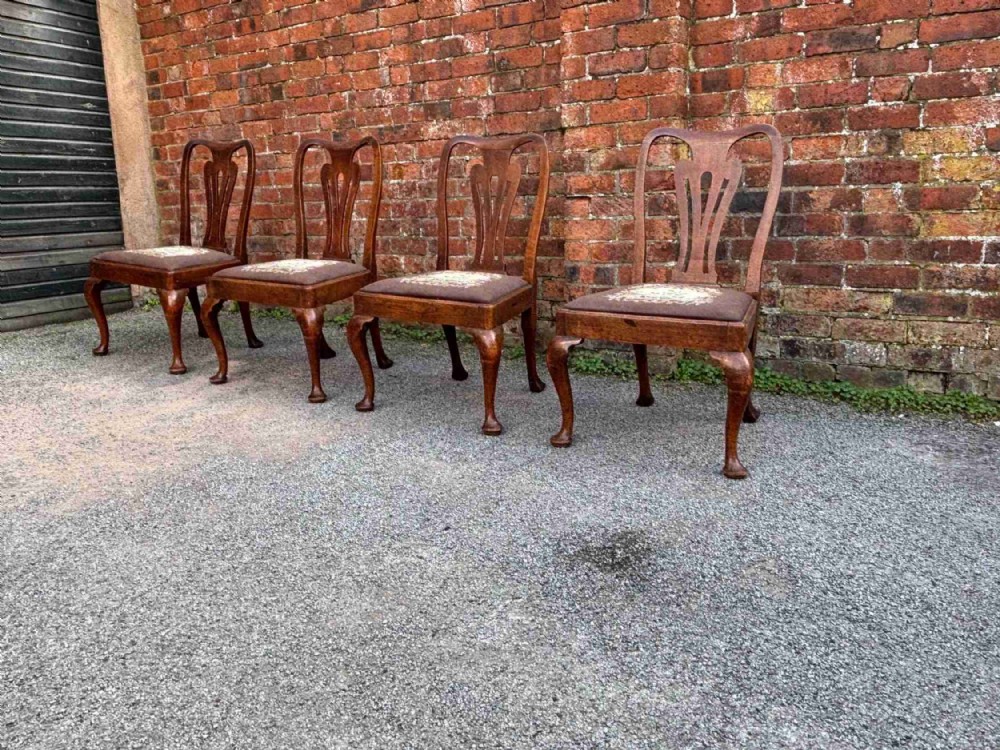 a set of four 18th century geo ii walnut chairs